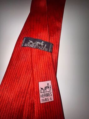 Hermes Orange-Red Silk Tie with Subtle Stripe Motif